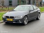 BMW 3-Serie 320i High Executive Cremeleer Navi Pdc Headup