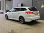 Ford Focus Wagon 1.0 ST-Line | Voorruitverwarming | PDC V+A | Getint Glas | 18 Inch | Park Assist