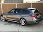 BMW 3-Serie Touring 318i M Sport Automaat | Trekhaak uitklapbaar | Leren bekleding | Stoelverwarming | Cruise & climate control | LED verlichting | Navigatiesysteem Proffesional | Parkeersensoren achter