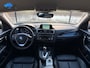 BMW 1-Serie 118i Sport Line Aut.| Leder | PDC Voor & Achter | Stoelverw. | Trekhaak | CC | 17"LMV