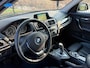 BMW 1-Serie 118i Sport Line Aut.| Leder | PDC Voor & Achter | Stoelverw. | Trekhaak | CC | 17"LMV