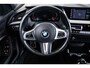 BMW 1-Serie 118i High Executive M Sport - Sportstoelen - Stoelverwarming - PDC Voor/Achter - Cruise control - Getinte Ruiten - High Beam Assistant - Multifunctioneel stuurwiel - Elektrische verstelbare lendensteunen -