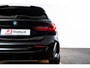 BMW 1-Serie 118i High Executive M Sport - Sportstoelen - Stoelverwarming - PDC Voor/Achter - Cruise control - Getinte Ruiten - High Beam Assistant - Multifunctioneel stuurwiel - Elektrische verstelbare lendensteunen -
