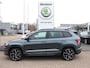 Skoda Karoq 1.5 TSI 150pk AUTOMAAT Sportline Business | Trekhaak | Achteruitrijcamera | Stoelverwarming | Adaptieve cruise control | Elektrische achterklep |
