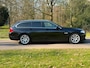 BMW 5-Serie Touring 528xi High Executive Airco | Automaat | Stoelverwarming | elektrische trekhaak