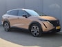 Nissan Ariya e-4ORCE Evolve+ Pack 87 kWh Automaat / Accu SOH 99% / Fabrieksgarantie tot 07-2027 / CCS snelladen / WLTP bereik 498 km bereik stad 612 km / Head Up Display / Glazen schuif- en kanteldak / Stuur-, Stoel & Achterbank verwarming / Elektrische achterklep / Stoelverkoeling / Bose Audio Systeem /