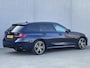 BMW 3-Serie Touring 330e xDrive M Sport Plug-in PHEV Automaat / FACE LIFT / Shadow Line / Panorama dak / Wide Screen / 1500kg Trekgewicht / M-pakket / Parkeerassistent-pakket / 18" breedset LM wielen / Elektrische achterklep / Elektrische Stoelen / HUD / Apple Carplay/Android /