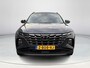 Hyundai Tucson 1.6 T-GDI PHEV Premium 4WD | Lederen bekleding | Stoel- en stuurverwarming | 4WD | Navigatiesysteem | Climate Control | Adaptieve Cruise Control | Plug Inn hybride | Full options | Resterende fabrieksgarantie | Rijklaarprijs |