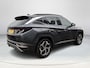 Hyundai Tucson 1.6 T-GDI PHEV Premium 4WD | Lederen bekleding | Stoel- en stuurverwarming | 4WD | Navigatiesysteem | Climate Control | Adaptieve Cruise Control | Plug Inn hybride | Full options | Resterende fabrieksgarantie | Rijklaarprijs |