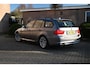 BMW 3-Serie Touring 318i Business Line 143 PK Aut. Navi Clima Cruise Trekhaak PDC 17''