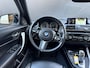 BMW 1-Serie M140i High Executive Schuifdak h&K Leer Performance