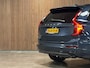 Volvo XC90 T8 AWD Recharge Ultra Dark | Luchtvering | Trekhaak | 360 Camera | Head-Up Display | Harman Kardon | 455pk | Adaptieve Cruise Control | Stoelverwarming voor+achter | Stuurwielverwarming | Schuifdak | Full LED Matrix Meesturende koplampen | Pilot Assist | BLIS Dode Hoek Detectie | Alcantara hemelbekleding | Lederen zonnekleppen en handgrepen | Elektrische voorstoelen geheugen | Nordico Quilted bekleding | Zitting verlenging voorstoelen | Lederen dashboard | 21 Inch | Google Infotainment | Keyless Drive | Privacy Glass | Elektrisch bedienbare achterklep | Geïntegreerd kinderzitje achterin | Geïntegreerde zongordijnen achterportieren | Verlichte instaplijsten | 7-Persoons | 4-Zone Climate Control | DAB Radio | Apple Carplay/Android Auto | Alarm Klasse III | Draadloos telefoon opladen | Volvo On Call met mobiele App functie | Denim Blue Metallic |