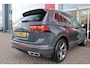 Volkswagen Tiguan 1.5 TSI 150PK R-Line Business+ | LED MATRIX KOPLAMPEN (IQ LIGHT) | NAVIGATIE | R-LINE INTERIEUR/EXTERIEUR | VERWARMBARE VOORSTOELEN | BEKLEDING LEDER VIENNA | AKOESTISCH GLAS GETINT | KEYLESS ACCESS/START | ELEKTRISCH BEDIENABRE ACHTERKLEP | DAKSPOILER R-LINE | APPLE CARPLAY/ANDROID AUTO | DAB+ RADIO | DRAADLOZE TELEFOONLADER | DIGITAAL DASHBOARD | CLIMA CONTROL VOOR EN ACHTERIN |