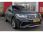 Volkswagen Tiguan 1.5 TSI 150PK R-Line Business+ | LED MATRIX KOPLAMPEN (IQ LIGHT) | NAVIGATIE | R-LINE INTERIEUR/EXTERIEUR | VERWARMBARE VOORSTOELEN | BEKLEDING LEDER VIENNA | AKOESTISCH GLAS GETINT | KEYLESS ACCESS/START | ELEKTRISCH BEDIENABRE ACHTERKLEP | DAKSPOILER R-LINE | APPLE CARPLAY/ANDROID AUTO | DAB+ RADIO | DRAADLOZE TELEFOONLADER | DIGITAAL DASHBOARD | CLIMA CONTROL VOOR EN ACHTERIN |