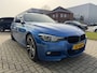 BMW 3-Serie Touring 320i M Sport Edition Pano | HUD | Navi
