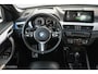 BMW X1 xDrive25e High Executive | M-Sport | LED | HUD | Trekhaak | PHEV | Miniral Grau | Stoelverw.