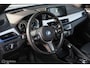 BMW X1 xDrive25e High Executive | M-Sport | LED | HUD | Trekhaak | PHEV | Miniral Grau | Stoelverw.