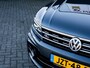 Volkswagen Tiguan 2.0 TSI 4Motion Highline R Line | Virtual Cockpit | Camera | Matrix LED Koplampen | Adaptieve Cruise Control | Navigatie | Stoelverwarming | Stuurwiel Verwarmd | Velours Bekleding | Elektrische Kofferklep | 4x4 |