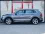 Volkswagen Tiguan 2.0 TSI 4Motion Highline R Line | Virtual Cockpit | Camera | Matrix LED Koplampen | Adaptieve Cruise Control | Navigatie | Stoelverwarming | Stuurwiel Verwarmd | Velours Bekleding | Elektrische Kofferklep | 4x4 |
