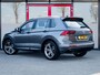 Volkswagen Tiguan 2.0 TSI 4Motion Highline R Line | Virtual Cockpit | Camera | Matrix LED Koplampen | Adaptieve Cruise Control | Navigatie | Stoelverwarming | Stuurwiel Verwarmd | Velours Bekleding | Elektrische Kofferklep | 4x4 |