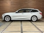 BMW 3-Serie Touring 320e Sportline | Pano | Leder | Laser | Shadow Line | Trekhaak elektr. | 18 inch | Stoelverwarming