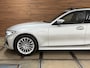BMW 3-Serie Touring 320e Sportline | Pano | Leder | Laser | Shadow Line | Trekhaak elektr. | 18 inch | Stoelverwarming