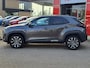 Toyota Yaris Cross 1.5 Hybrid 115 First Edition APPLE/ANDROID STOEL/STUURVERWARMING NAVI AD-CRUISE PRIVACY-GLASS 17"LM-VELGEN