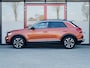 Volkswagen T-Roc 1.5 TSI Sport | Trekhaak | Beats Premium Audio | Stoelverwarming | Dode Hoek Detectie | Virtual Cockpit | Adaptieve Cruise Control | Climate Control | Camera | Parkeer Assist | Flippers | Two-Tone Metallic |