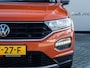 Volkswagen T-Roc 1.5 TSI Sport | Trekhaak | Beats Premium Audio | Stoelverwarming | Dode Hoek Detectie | Virtual Cockpit | Adaptieve Cruise Control | Climate Control | Camera | Parkeer Assist | Flippers | Two-Tone Metallic |
