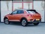 Volkswagen T-Roc 1.5 TSI Sport | Trekhaak | Beats Premium Audio | Stoelverwarming | Dode Hoek Detectie | Virtual Cockpit | Adaptieve Cruise Control | Climate Control | Camera | Parkeer Assist | Flippers | Two-Tone Metallic |
