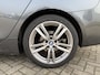 BMW 2-Serie Gran Tourer 218i High Executive M Sport Leder Panoramadak Achteruitrijcamera Trekhaak 18 Inch PDC Stoelverwarming