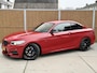 BMW 2-Serie Coupé M235i High Executive Sportautomaat | Leer | Elektrisch verstelbare voorstoelen | Stoelverwarming | Parkeersensoren achter | harman/kardon HiFi | Climate & cruise control | Mosselman 400pk | Origineel Nederlands
