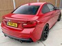 BMW 2-Serie Coupé M235i High Executive Sportautomaat | Leer | Elektrisch verstelbare voorstoelen | Stoelverwarming | Parkeersensoren achter | harman/kardon HiFi | Climate & cruise control | Mosselman 400pk | Origineel Nederlands