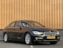 BMW 3-Serie 320i Edition Luxury Line Purity Executive | Origineel Nederlands | Panoramadak | Cruise Control | Keyless | Parkeersensoren | Stoelverwarming | Stuurverwarming | Navigatie | Bluetooth