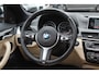 BMW X1 sDrive18i Centennial High Exe. 107.983 km! / Panoramadak / Head-up / Leder / 18'' / Keyless / Navigatie / Sportstoelen / Stoelverwarming / Cruise Control