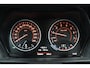 BMW 1-Serie 118i Centennial High Executive (PANORAMADAK, STOELVERWARMING, CRUISE CONTROL, NAVIGATIE, DEALER ONDERHOUDEN)