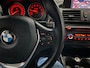 BMW 1-Serie 116i Upgrade Edition LEDER / NAVIGATIE / XENON