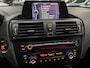 BMW 1-Serie 116i Upgrade Edition LEDER / NAVIGATIE / XENON