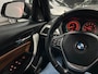 BMW 1-Serie 116i Upgrade Edition LEDER / NAVIGATIE / XENON