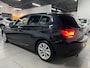 BMW 1-Serie 116i Upgrade Edition LEDER / NAVIGATIE / XENON