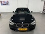 BMW 1-Serie 116i Upgrade Edition LEDER / NAVIGATIE / XENON
