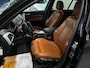 BMW 1-Serie 116i Upgrade Edition LEDER / NAVIGATIE / XENON