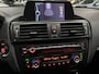 BMW 1-Serie 116i Upgrade Edition LEDER / NAVIGATIE / XENON