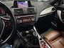 BMW 1-Serie 116i Upgrade Edition LEDER / NAVIGATIE / XENON