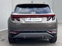 Hyundai Tucson 1.6 T-GDI HEV Comfort Smart Automaat / Dealer onderhouden / Afneembare trekhaak 1.650 kg / Elektrische klep / Adaptieve CC / Stuur- & stoelverwarming  / Navigatie / Camera / Apple Carplay Android / 19" LM + all season banden /