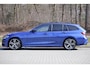 BMW 3-Serie Touring 330i xDrive High Executive M-pakket | Pano | HUD | 19" | Laser | Keyless | Hifi | Camera | DAB | Elektr. stoel + mem | Alarm kl.3 | Etc.