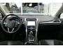 Ford Mondeo Wagon 2.0 IVCT HEV Titanium ELEKT. TREKHAAK (750KG), WINTER PACK, MEMORY, CRUISE, CLIMA, NAVI, CAMERA, PDC V&A, APPLE CARPLAY/ANDROID AUTO, BLIS, KEYLESS, ELEKT. PASSAGIERSSTOEL, ELEKT. ACHTERKLEP, ADAPTIEVE KOPLAMPEN, LANE ASSIST, 57.812KM