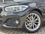 BMW 1-Serie 118i Corporate Lease High Executive | Navigatie | LM Velgen 17" | Elektrisch Glazen Panoramadak | Voorstoelen Verwarmd | M-Sportpakket | Cruise Control | Airco |