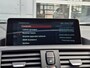 BMW 1-Serie 118i Corporate Lease High Executive | Navigatie | LM Velgen 17" | Elektrisch Glazen Panoramadak | Voorstoelen Verwarmd | M-Sportpakket | Cruise Control | Airco |