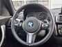 BMW 1-Serie 118i Corporate Lease High Executive | Navigatie | LM Velgen 17" | Elektrisch Glazen Panoramadak | Voorstoelen Verwarmd | M-Sportpakket | Cruise Control | Airco |